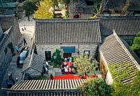 《老民居里喜事多》